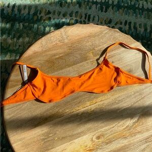 SKIMS orange bikini top